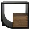 Corner view of a wooden dresser with three drawers hosted in a thick black frame and a top surface visible above.