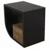Black wooden storage cabinet with three drawers and brass knobs; the top drawer is pulled open, revealing a light wood interior in front of a dark exterior.