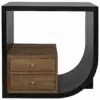 Close-up of a wooden dresser inside a large black frame with a rounded outer edge, showing two drawers and knob.