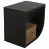 Curved black storage cabinet with stacked wooden drawers and brass knobs visible on the right side.