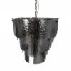 Hammered black metal hanging planter with a rusty chain suspenders and metal fasteners as decorative accents
