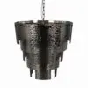 Hammered metal hanging bucket suspended by a chain, used as a lantern or planter.