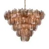 Copper-toned chandelier formed from overlapping glass-like discs hanging from a chain