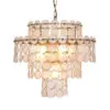 Gold pendant chandelier formed by overlapping circular discs, creating a layered, warm-glow fixture.