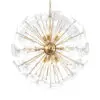 Gold sunburst chandelier with clear glass discs radiating from a central gold sphere, hanging chain showcases a decorative ceiling light.