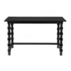 Rectangular black wooden table with ornately turned legs and a lower crossbar stretchers