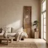 Living room corner with a tall wooden lattice screen, beige walls, and a light sofa near a window.